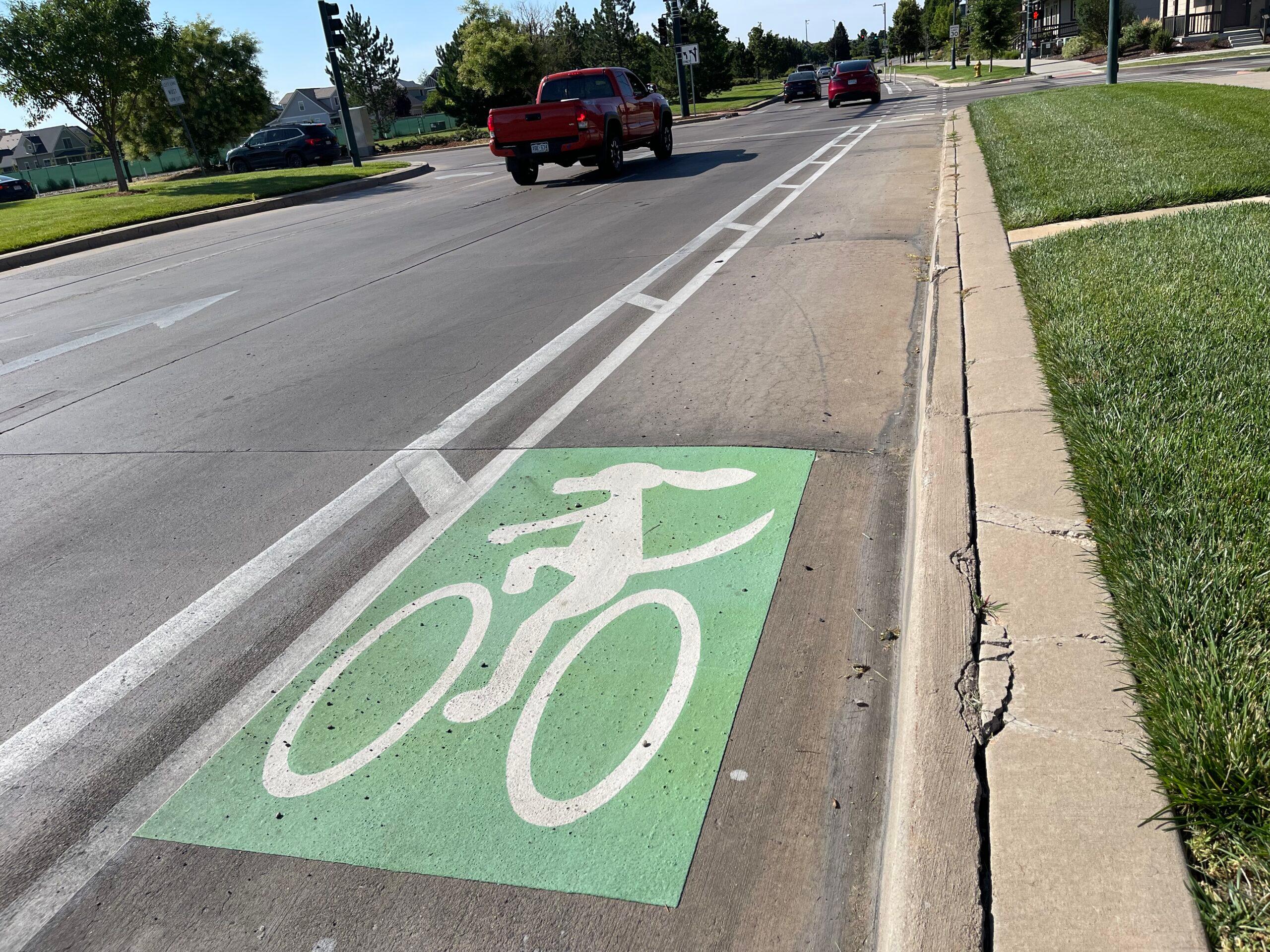 In the Central Park neighborhood, the bike lane symbol shows a cycling dog.
